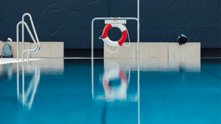 Swimming pool with lifebuoy illustrating the Bluey Pool episode about invisible parenting work
