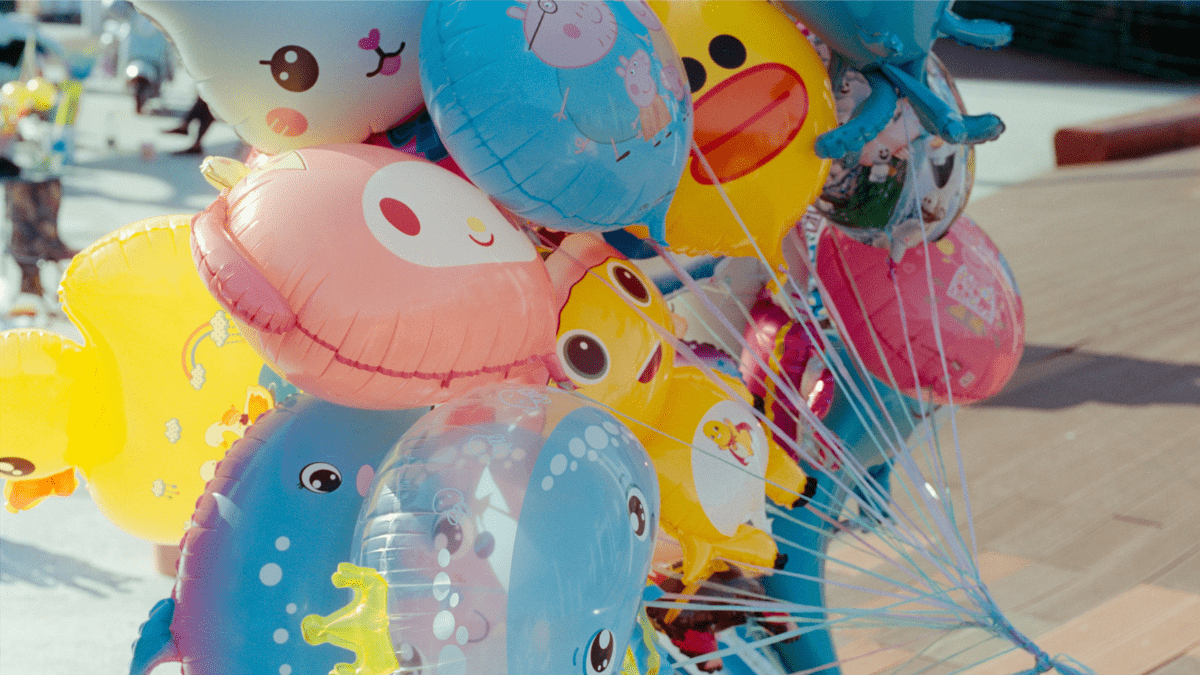 Colourful children's character balloons at a birthday party